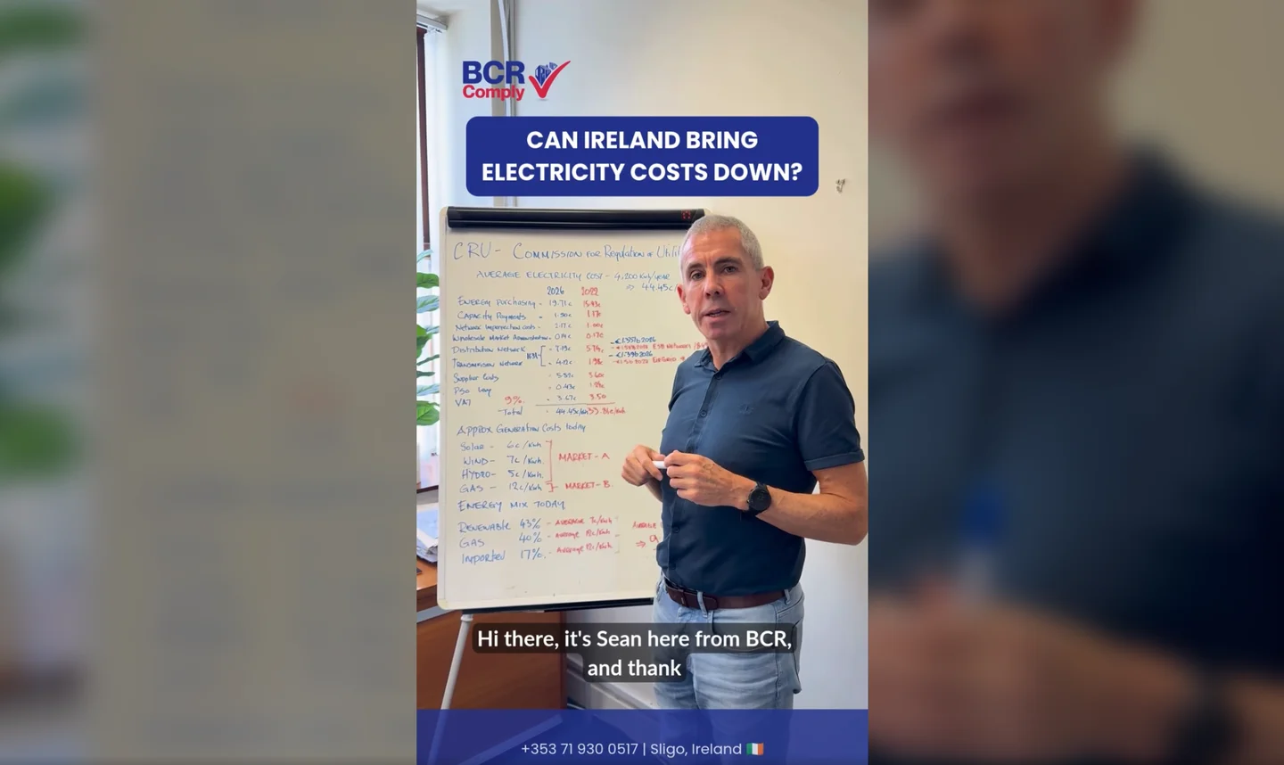 Sean from BCR Comply beside a flipchart, with the BCR logo and caption CAN IRELAND BRING ELECTRICITY COSTS DOWN?